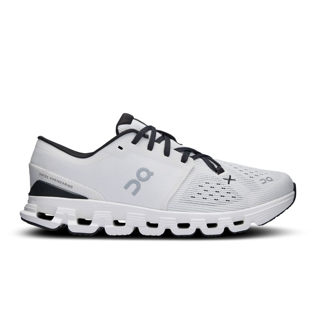 Side view on white background of Mens On Cloud X 4 running shoe in Ivory/Black, Medium (Regular) width