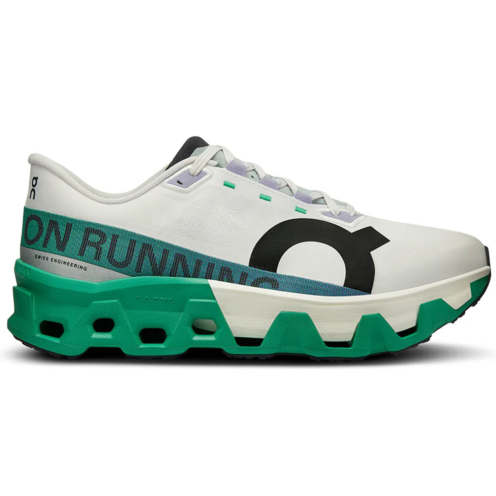 Side view on white background of Mens On Cloudmonster running shoe in White/Mint, Medium (Regular) width