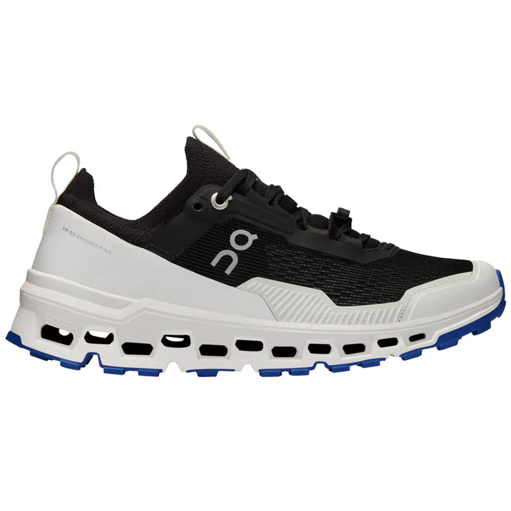Side view on white background of Mens On Cloudultra running shoe in Black/White, Medium (Regular) width