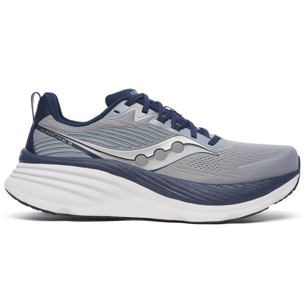 Side view on white background of Mens Saucony Hurricane running shoe in Flint/Navy, Medium (Regular) width