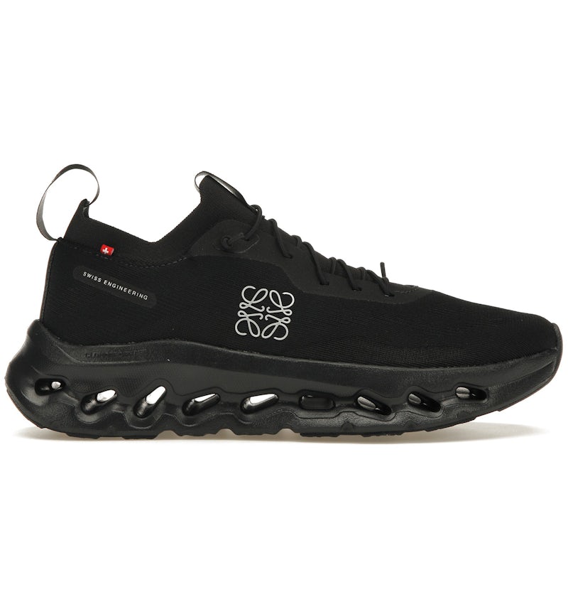 Side view on white background of Womens On Cloudtilt LOEWE running shoe in All Black, Medium (Regular) width
