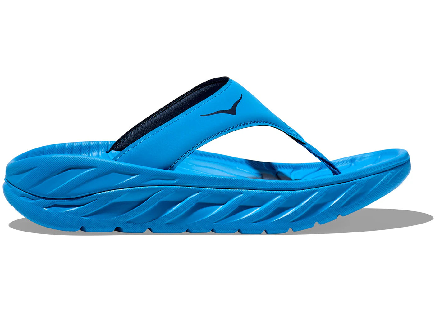 Side view on white background of Womens Hoka Ora Recovery Flip running shoe in Diva Blue/Outer Space, Medium (Regular) width