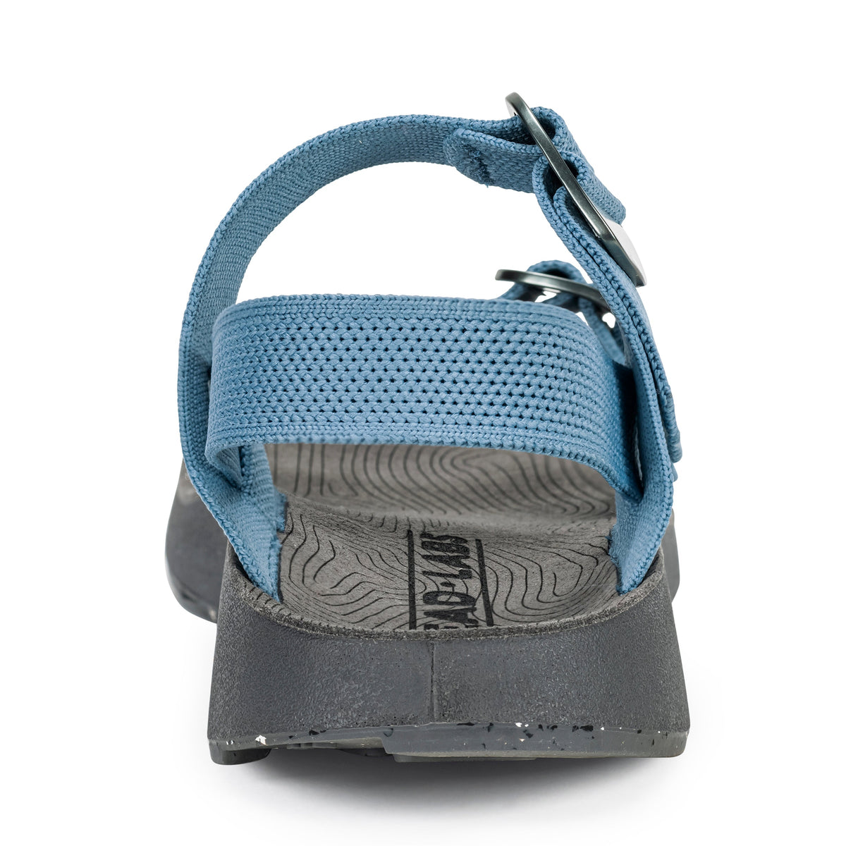 Back heel view of Tread Labs Salinas Slide sandal in Sky blue showing textured arch support footbed