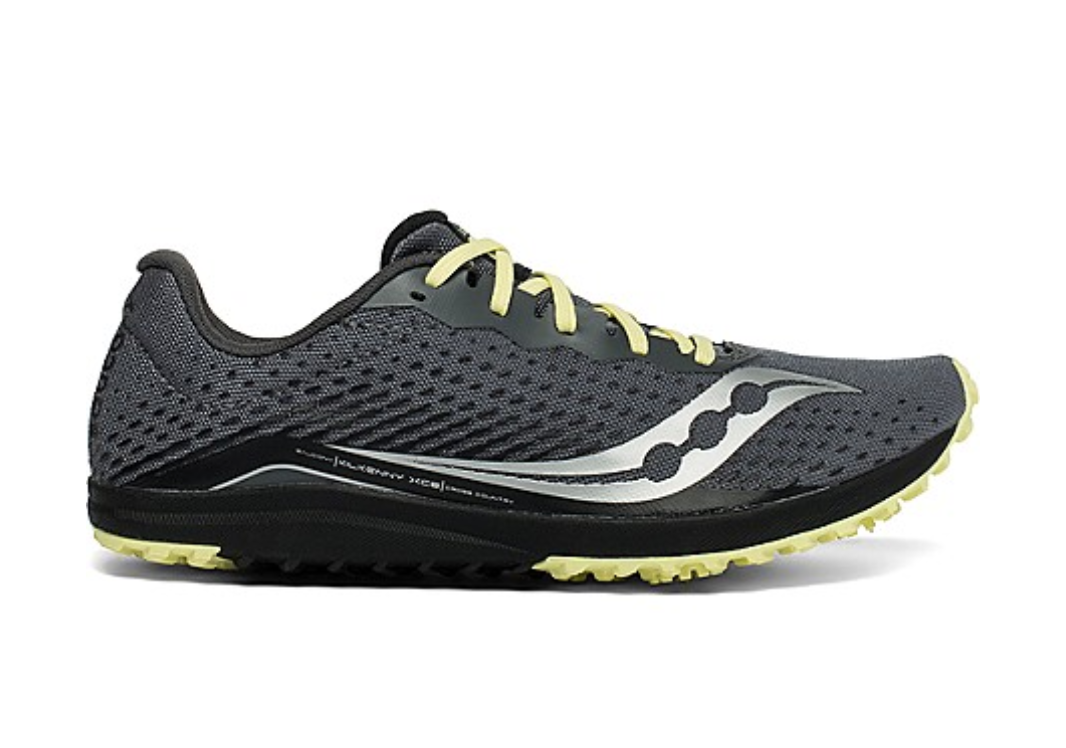 Side view on white background of Womens Saucony Kilkenny XC8 Spike running shoe in Black/Yellow, Medium (Regular) width