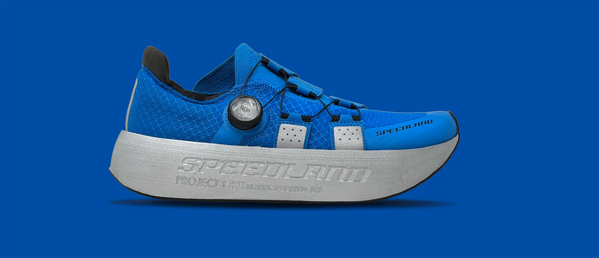 Side view on white background of Unisex Speedland RX:PNW running shoe in Blue/Gray, Medium (Regular) width
