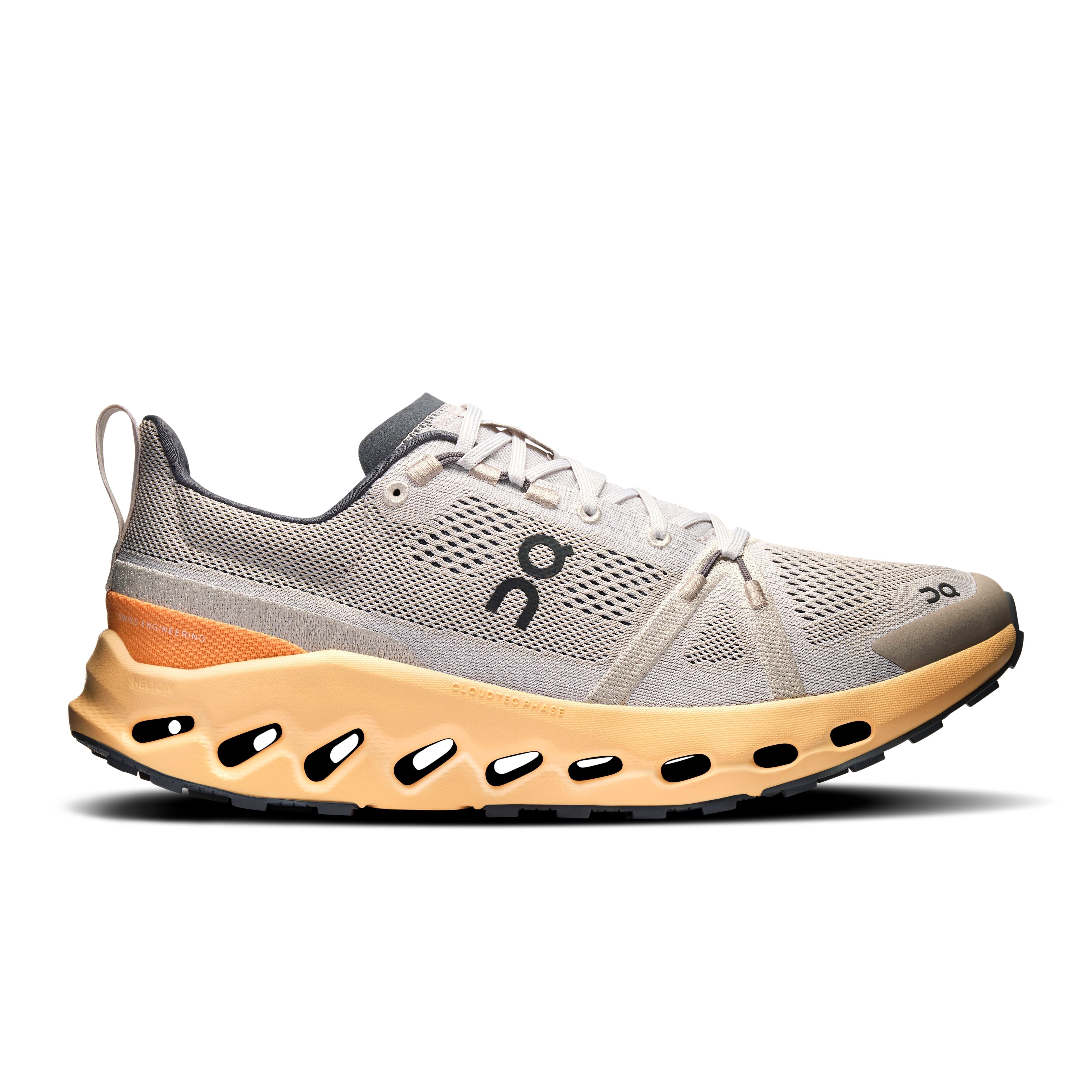 Side view on white background of Mens On Cloudsurfer Trail running shoe in Silver/Blonde, Medium (Regular) width