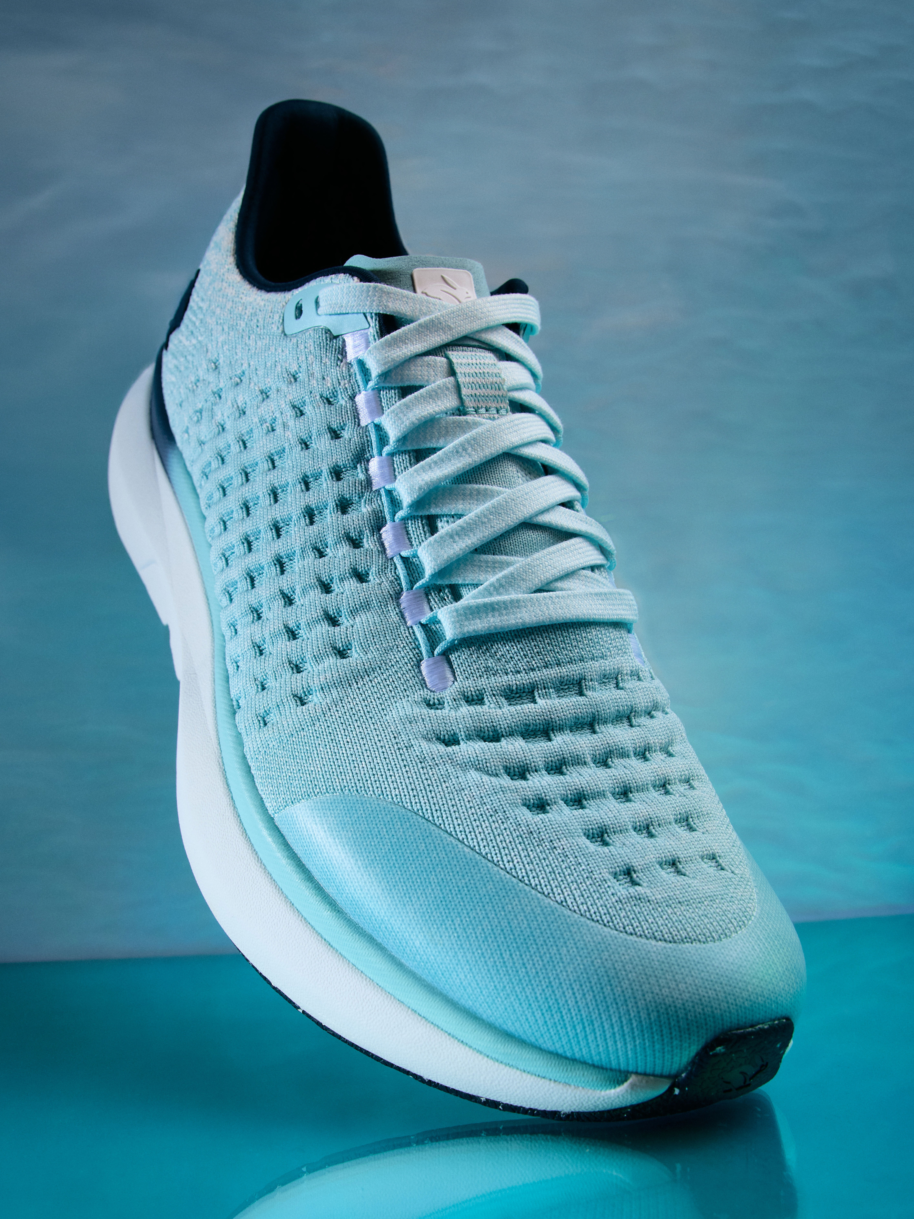 Side view on white background of Mens Rabbit Dream Chaser running shoe in Blue Glow, Medium (Regular) width