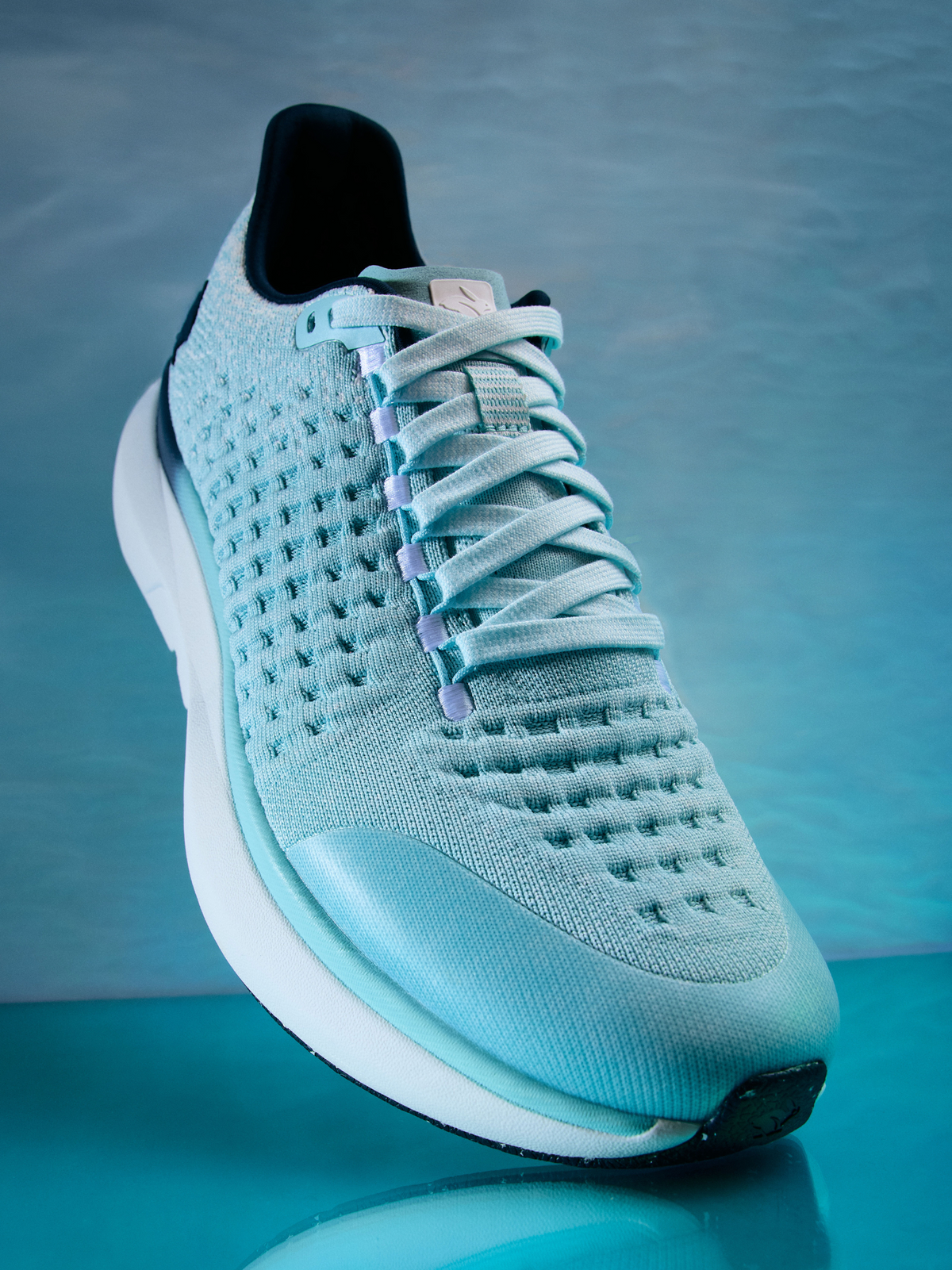 Side view on white background of Mens Rabbit Dream Chaser running shoe in Blue Glow, Medium (Regular) width