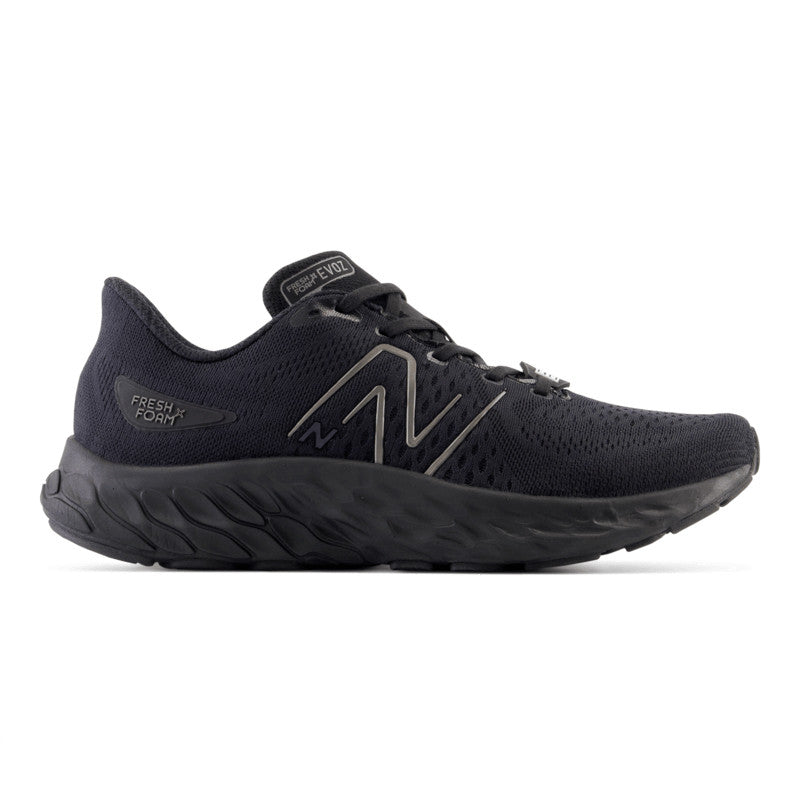 Side view on white background of Womens New Balance Fresh Foam X Evoz v3 running shoe in Black, Medium (Regular) width