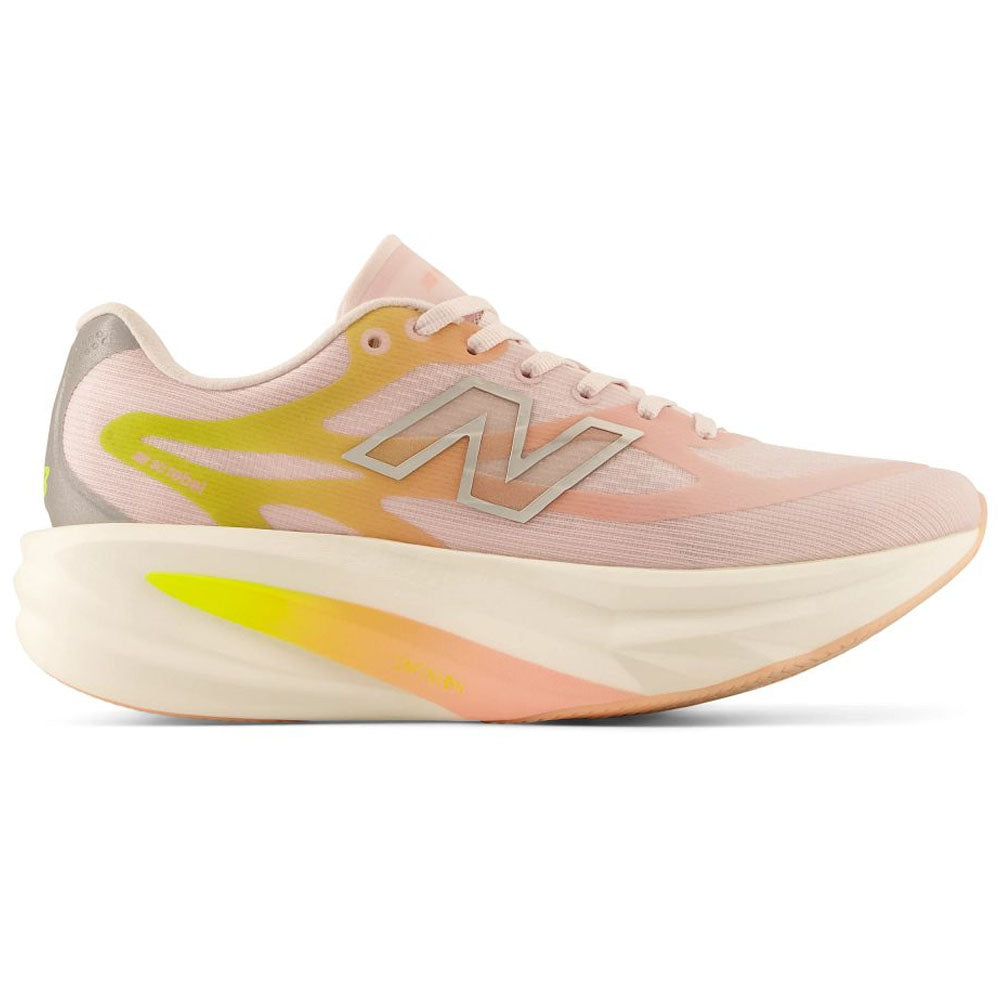 Side view on white background of Womens New Balance SuperComp Rebel running shoe in Pink Chalk/Pink Lemonade, Medium (Regular) width
