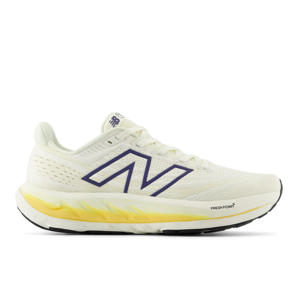 Side view on white background of Womens New Balance Fresh Foam Vongo v6 running shoe in Angora/Sea Salt/Clemetine, Medium (Regular) width