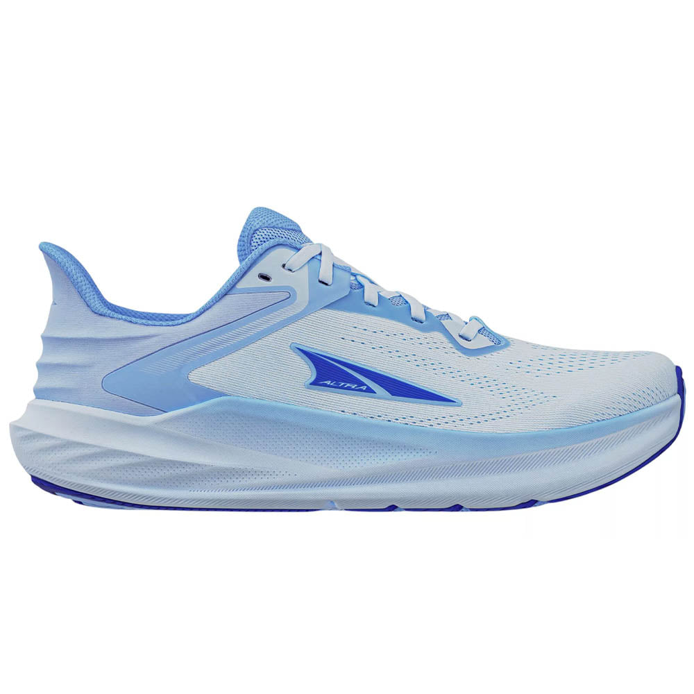 Side view on white background of Womens Altra Torin running shoe in Light Blue, Medium (Regular) width