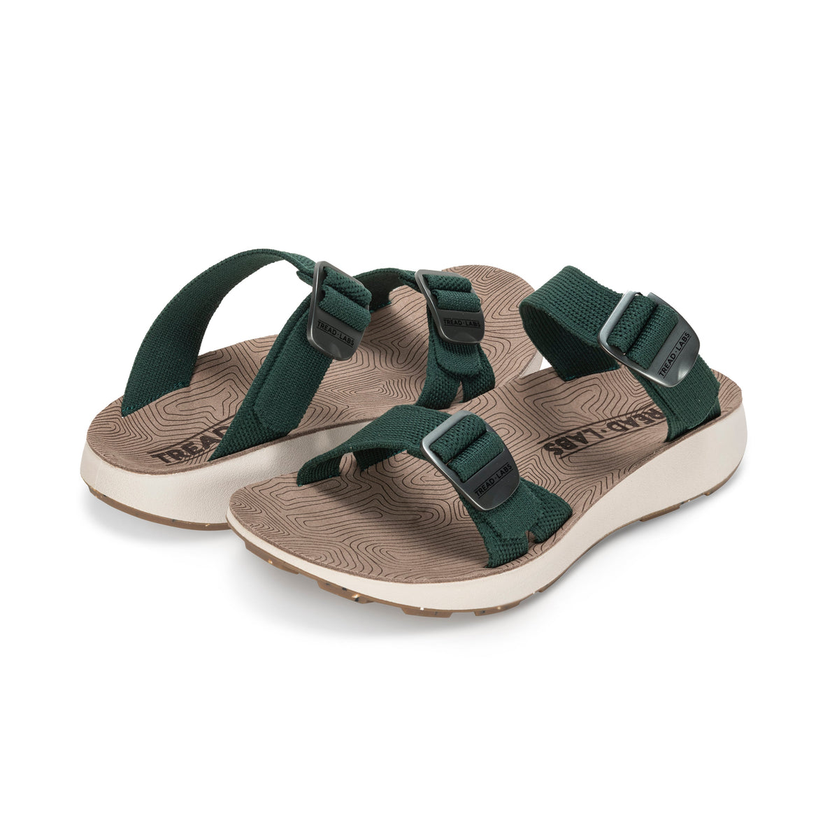 Pair of Tread Labs Salinas Slide women's arch support sandals in Ivy green, angled view showing double-buckle adjustable straps
