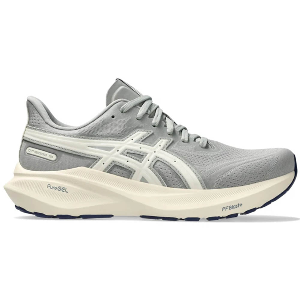 Side view on white background of Womens Asics GT-2000 running shoe in Seal Grey/Birch, Medium (Regular) width