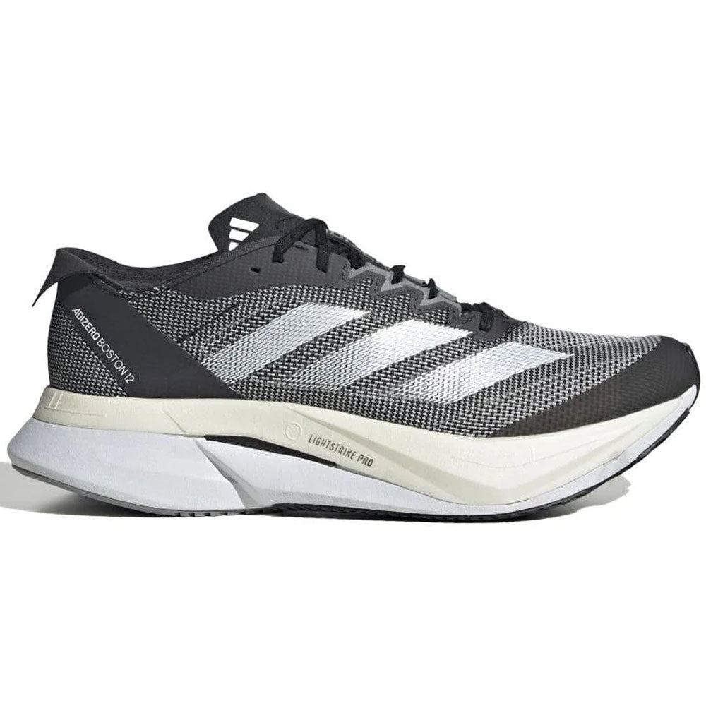 Side view on white background of Womens Adidas Adizero Boston 12 running shoe in Core Black/Cloud White/Carbon, Medium (Regular) width