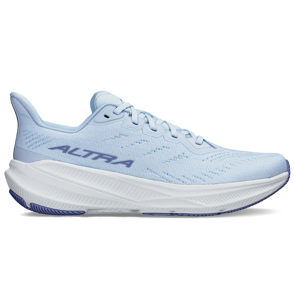 Side view on white background of Womens Altra Experience running shoe in Light Blue, Medium (Regular) width