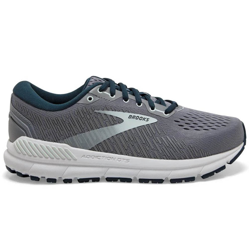 Side view on white background of Womens Brooks Addiction running shoe in Grey/Navy/Aqua, Extra Wide width