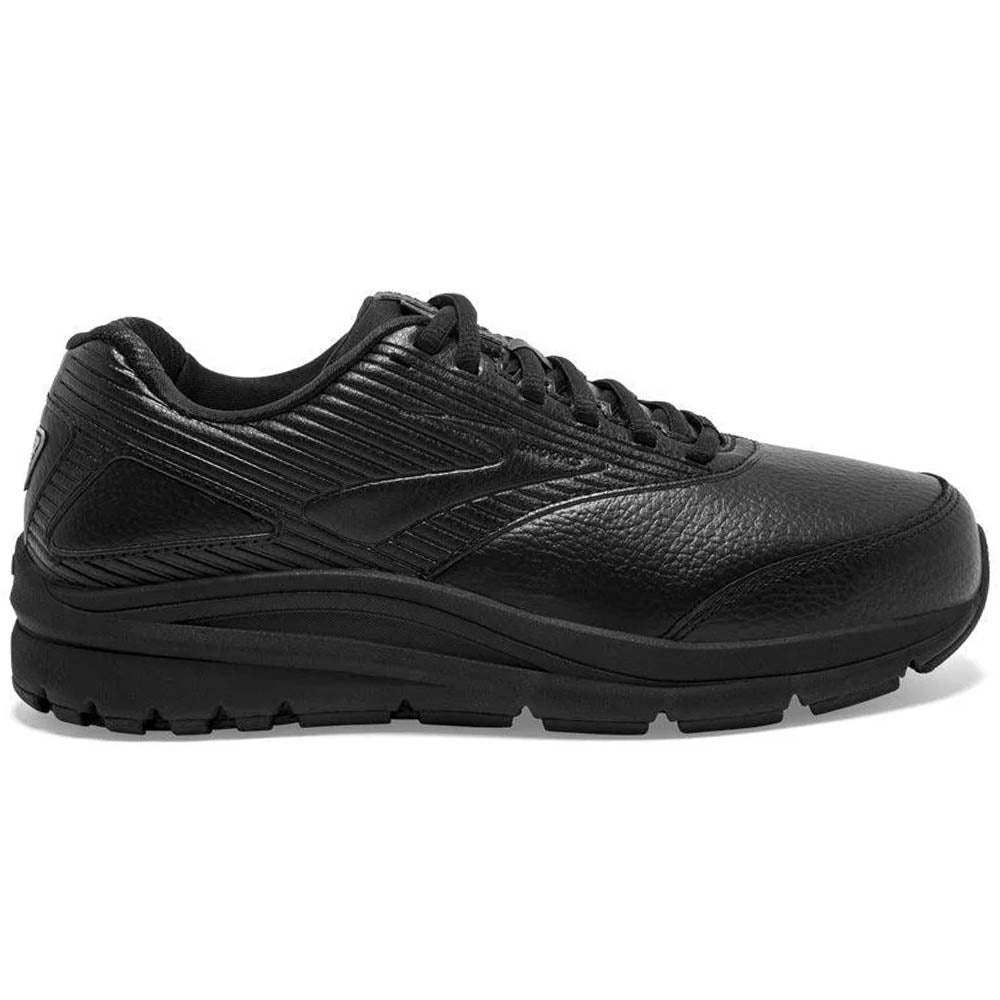 Side view on white background of Womens Brooks Addiction running shoe in Black/Black, Wide width