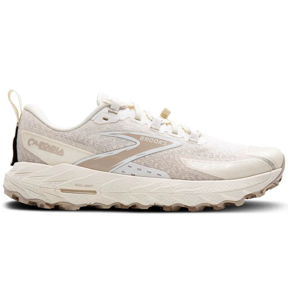 Side view on white background of Womens Brooks Cascadia running shoe in Coconut/Chateau/White, Medium (Regular) width