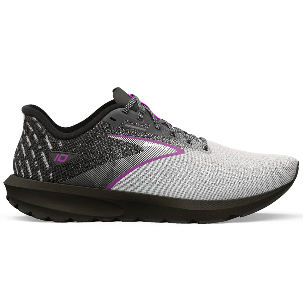Side view on white background of Womens Brooks Launch running shoe in Black/White/Violet, Wide width