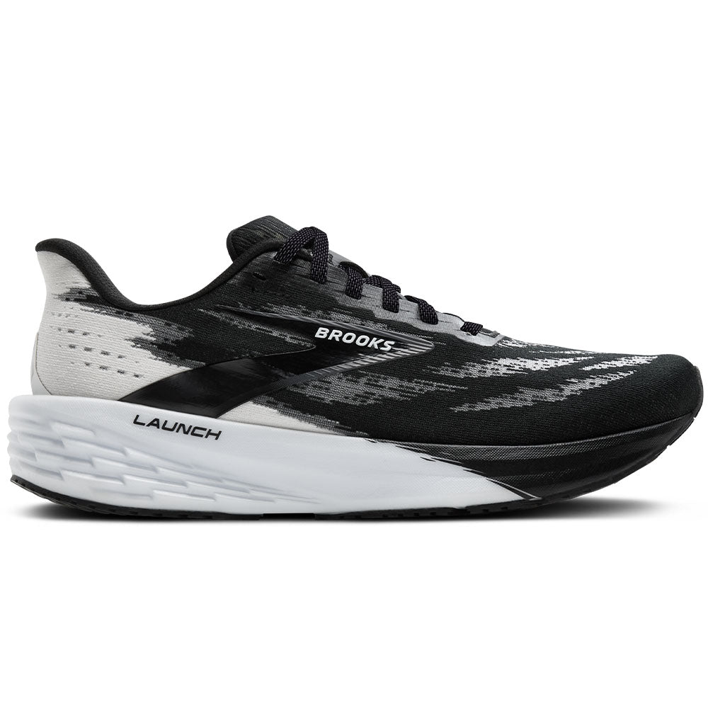 Side view on white background of Womens Brooks Launch running shoe in Black/White, Medium (Regular) width