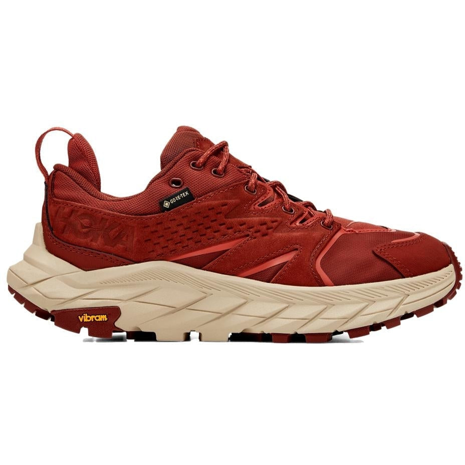 Side view on white background of Womens Hoka Anacapa running shoe in Cherry Mahogany/Hot Sauce, Medium (Regular) width