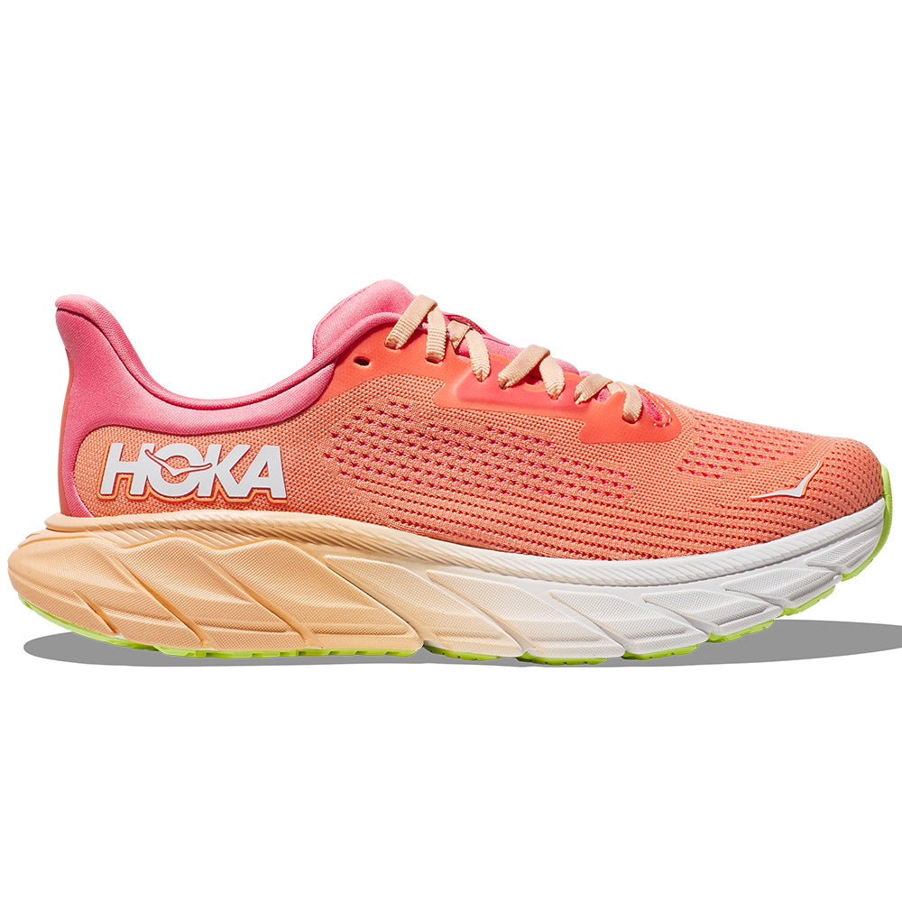 Side view on white background of Womens Hoka Arahi running shoe in Papaya/Coral, Medium (Regular) width