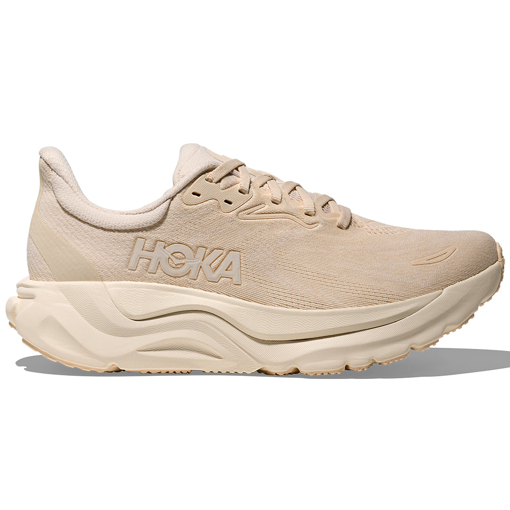 Side view on white background of Womens Hoka Arahi running shoe in Birch/Alabaster, Medium (Regular) width