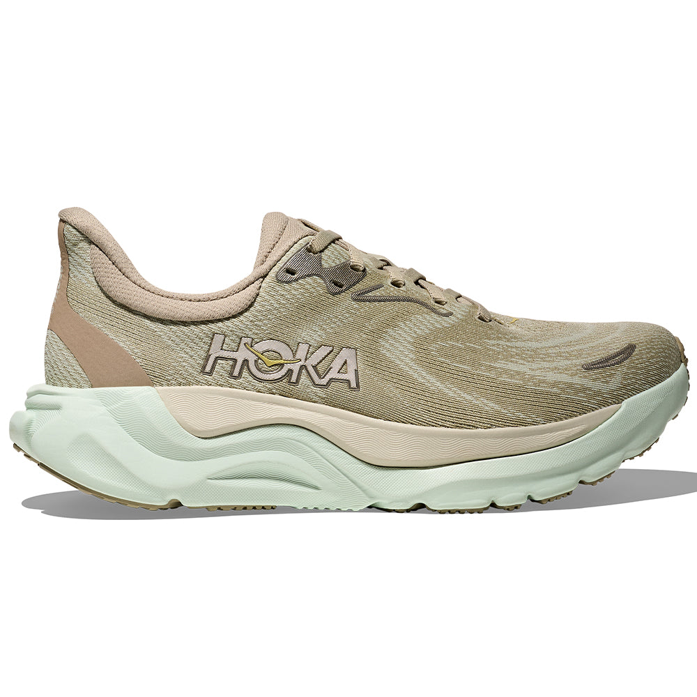 Side view on white background of Womens Hoka Arahi running shoe in Oyster Mushroom/Truffle Salt, Medium (Regular) width