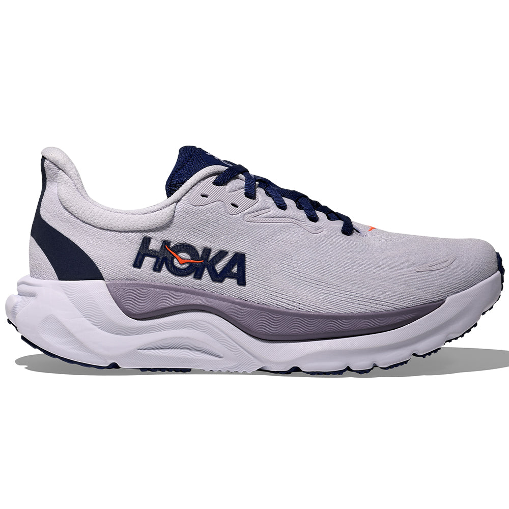 Side view on white background of Womens Hoka Arahi running shoe in Starlight Glow/Midnight Blue, Medium (Regular) width