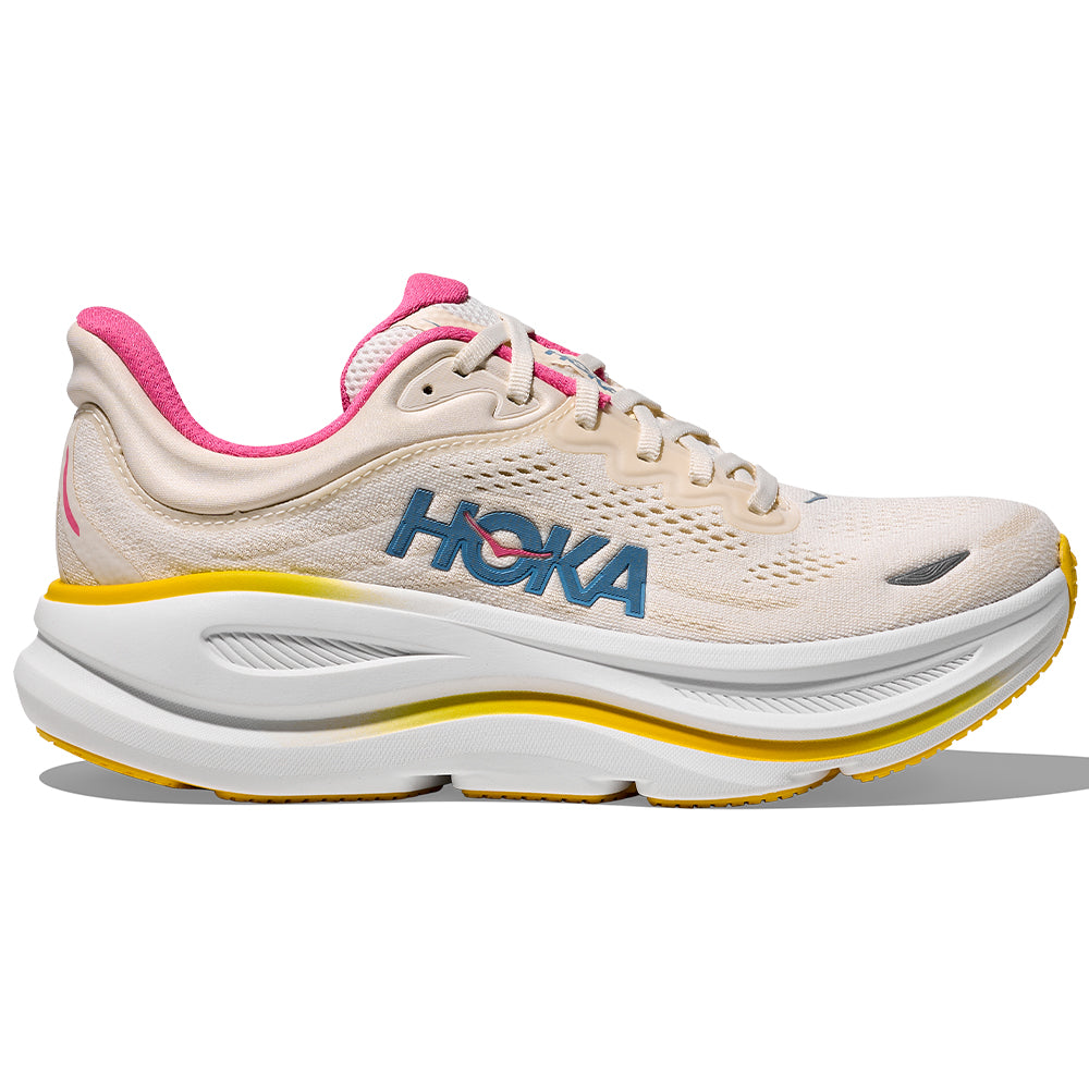 Side view on white background of Womens Hoka Bondi running shoe in Alabaster/Birch, Medium (Regular) width