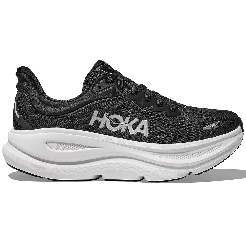 Side view on white background of Womens Hoka Bondi running shoe in Black/White, Medium (Regular) width
