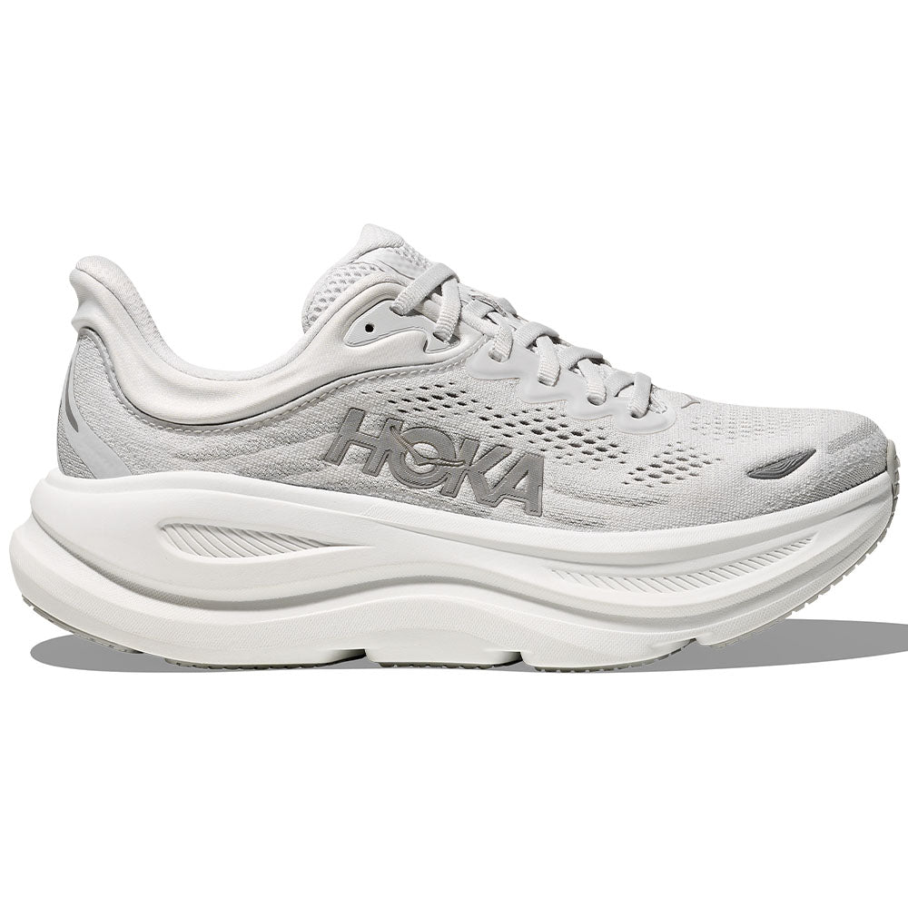 Side view on white background of Womens Hoka Bondi running shoe in Stardust/Silver, Medium (Regular) width