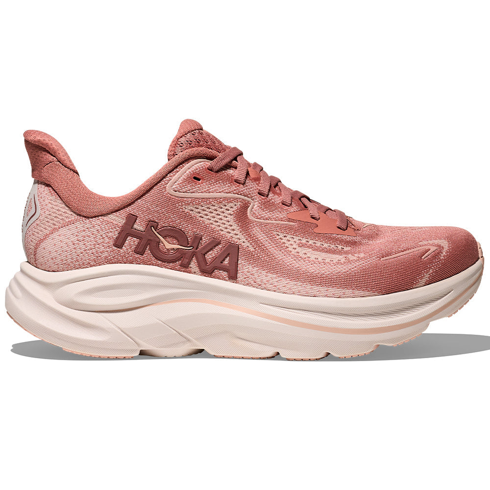 Side view on white background of Womens Hoka Clifton running shoe in Blush/Rose Latte, Medium (Regular) width