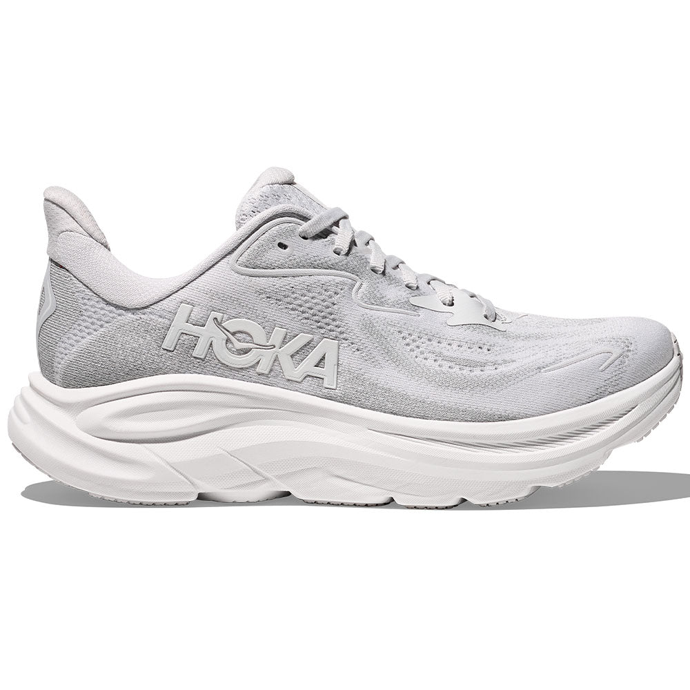 Side view on white background of Womens Hoka Clifton running shoe in Cosmic Grey/Stardust, Medium (Regular) width