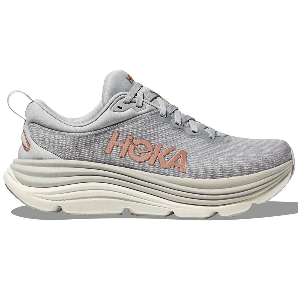 Side view on white background of Womens Hoka Gaviota running shoe in Harbor Mist/Rose Gold, Wide width