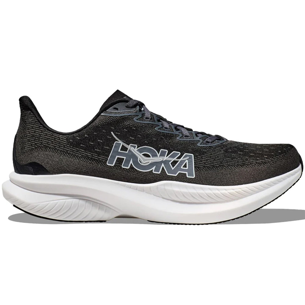 Side view on white background of Womens Hoka Mach running shoe in Black/White, Medium (Regular) width