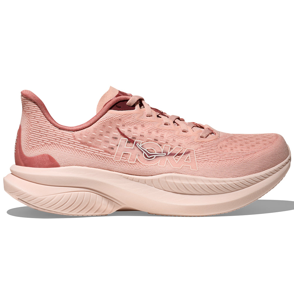 Side view on white background of Womens Hoka Mach running shoe in Rose Latte/Blush, Medium (Regular) width