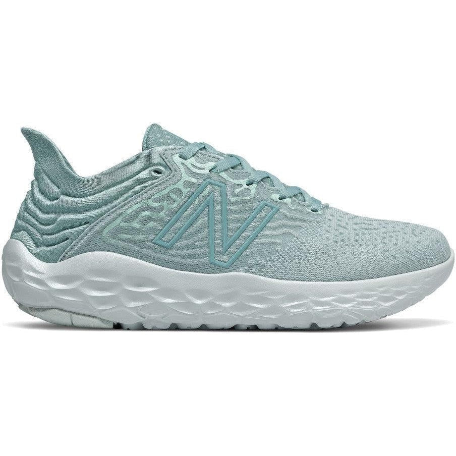 Side view on white background of Womens New Balance Fresh Foam Beacon running shoe in Storm Blue/Glacier, Medium (Regular) width