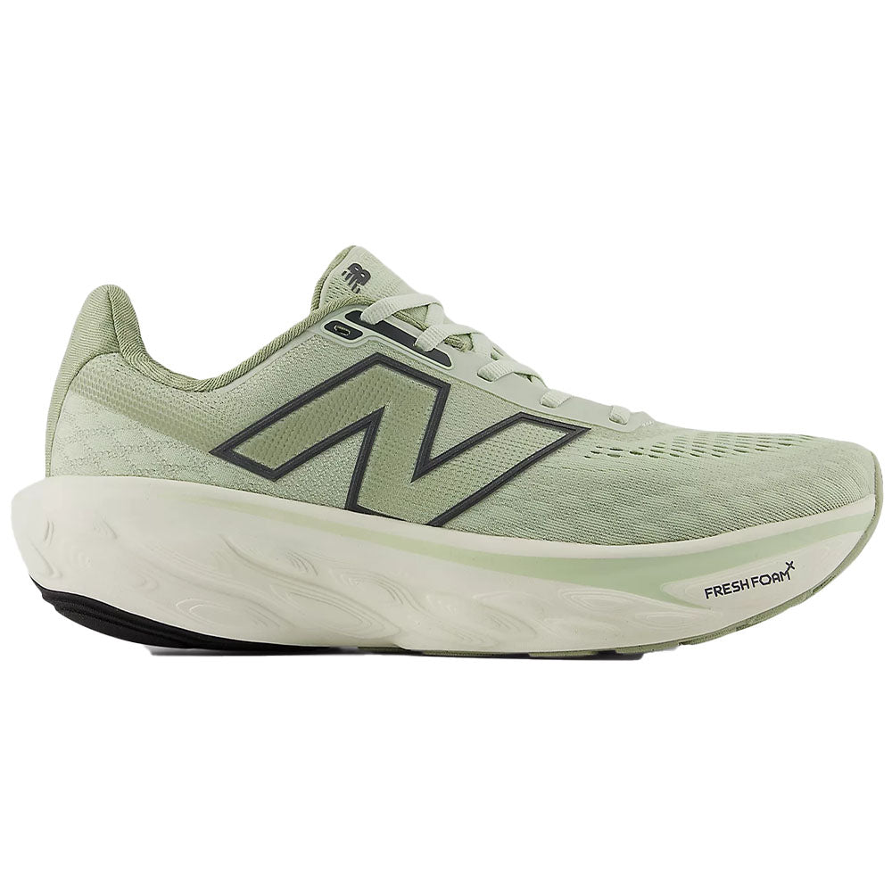Side view on white background of Womens New Balance Fresh Foam X 1080 running shoe in Natural Mint/Magnet, Wide width