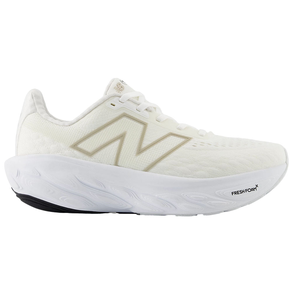 Side view on white background of Womens New Balance Fresh Foam X 1080 running shoe in White/Light Gold Metallic, Wide width