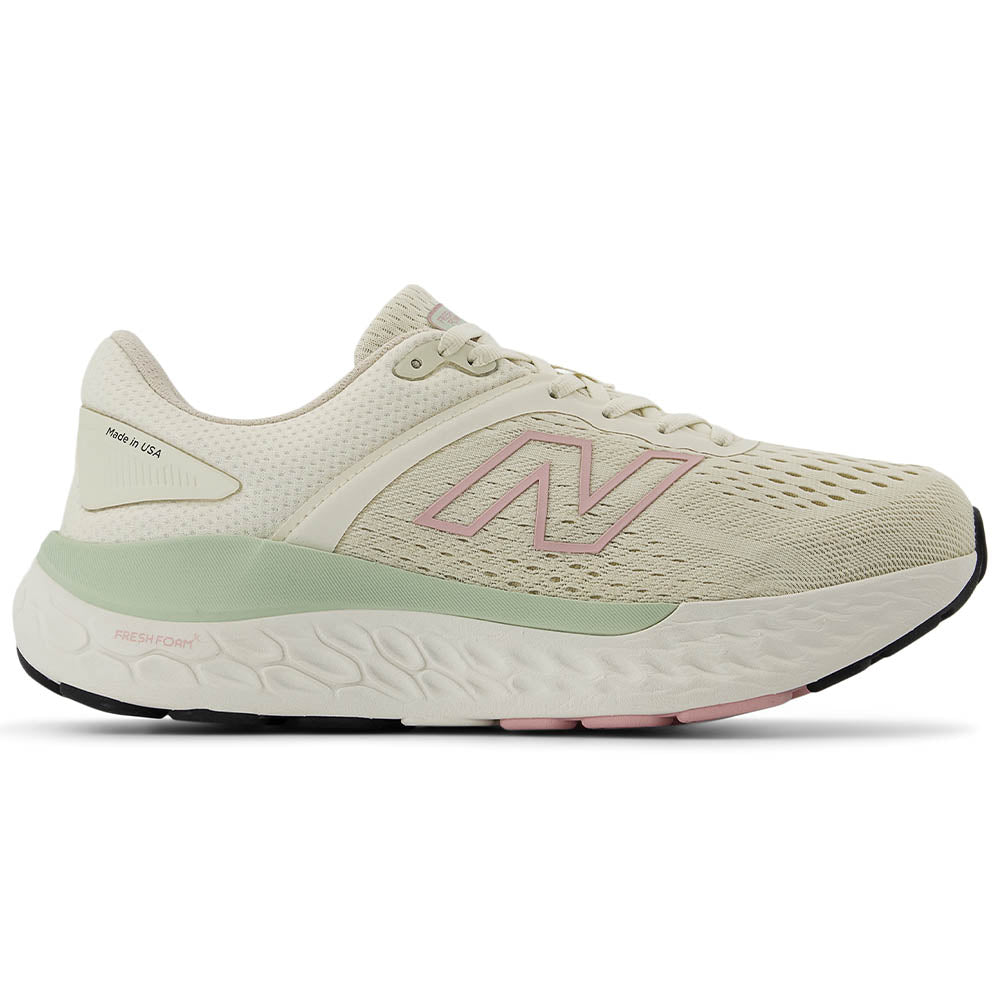 Side view on white background of Womens New Balance 1540 running shoe in Turtledove/Silver Moss, Medium (Regular) width