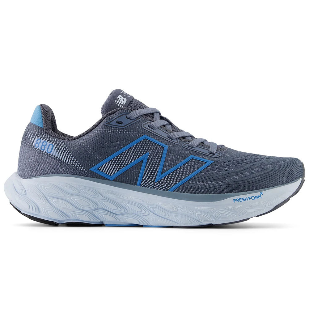 Side view on white background of Womens New Balance Fresh Foam 880 running shoe in Dark Arctic Grey/Coastal Blue/Quarry Blue, Wide width