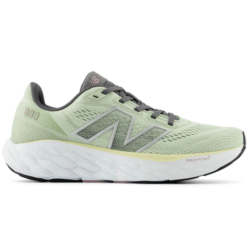 Side view on white background of Womens New Balance Fresh Foam 880 running shoe in Natural Mint/Silver Metallic/Ice Wine, Extra Wide width