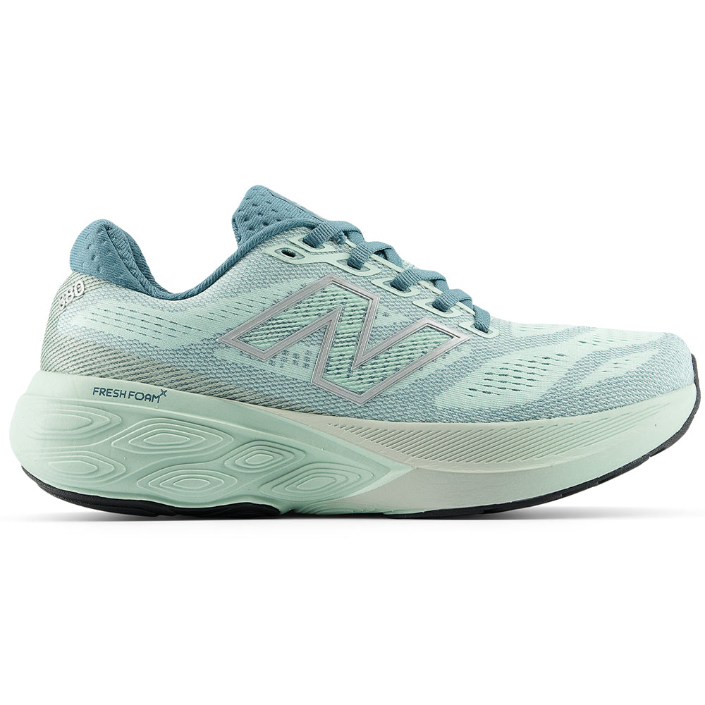 Side view on white background of Womens New Balance Fresh Foam 880 running shoe in Cosmic Jade/Silver Metallic, Wide width