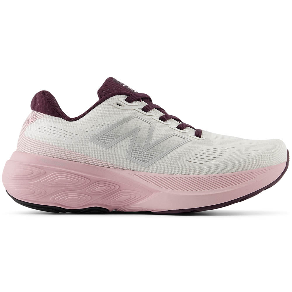 Side view on white background of Womens New Balance Fresh Foam 880 running shoe in Reflection/Rose Sugar/Grey Matter/Twilight Haze, Wide width