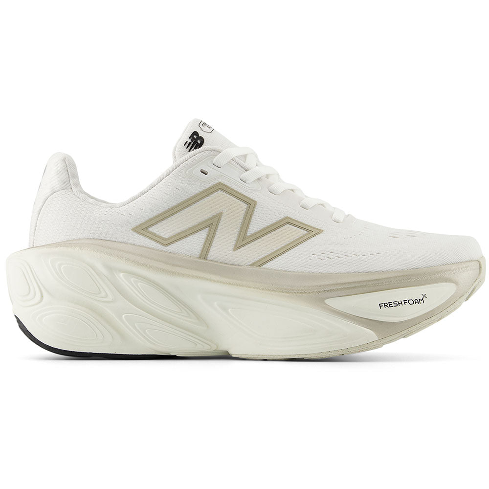 Side view on white background of Womens New Balance Fresh Foam X More running shoe in White/Sea Salt/Light Gold Metallic, Extra Wide width