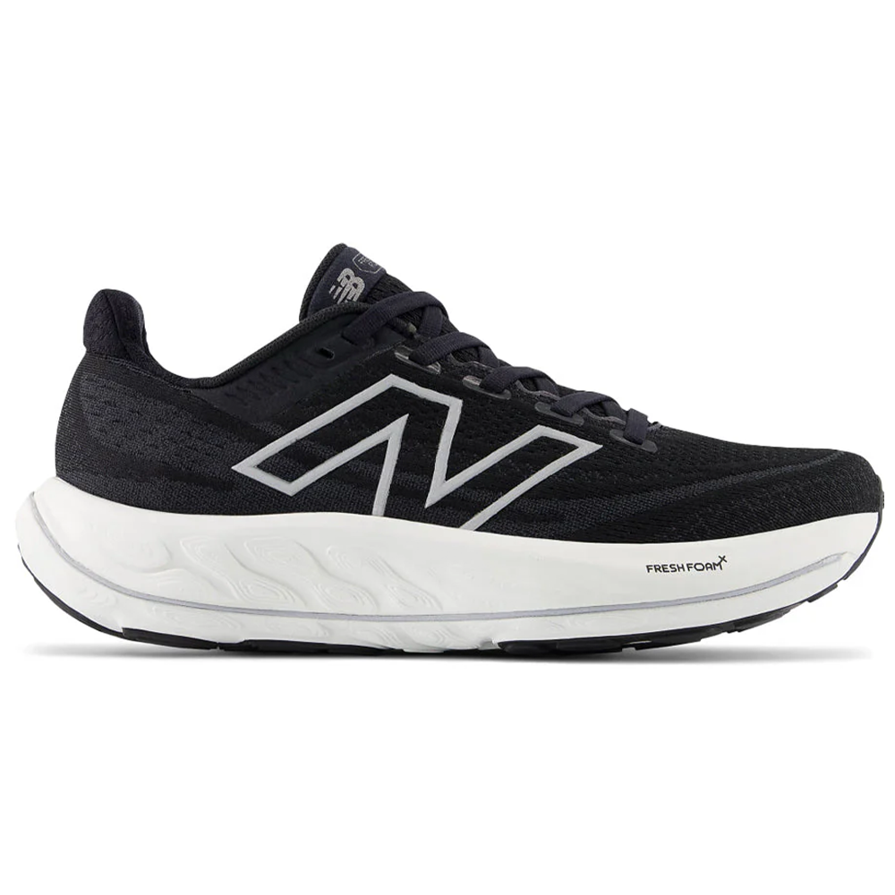 Side view on white background of Womens New Balance Fresh Foam Vongo running shoe in Black/White, Medium (Regular) width