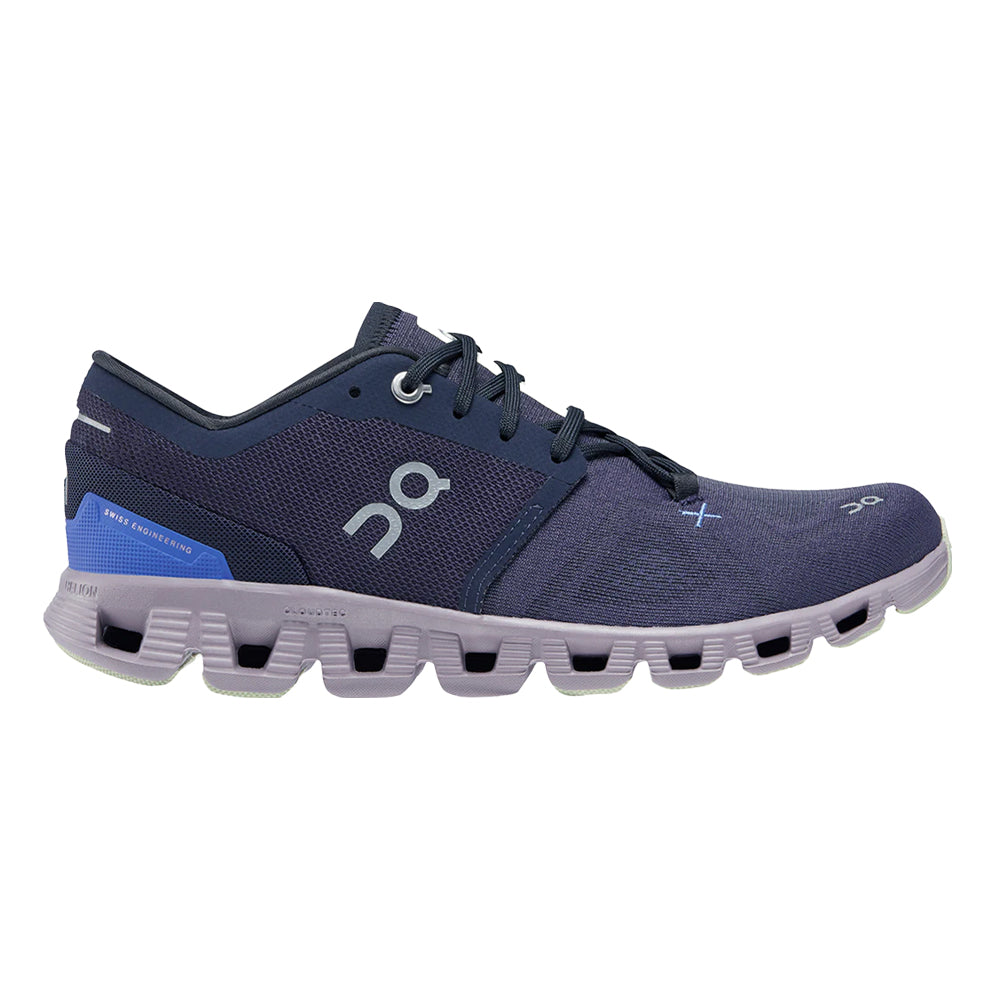 Side view on white background of Womens On Cloud X running shoe in Midnight/Heron, Medium (Regular) width
