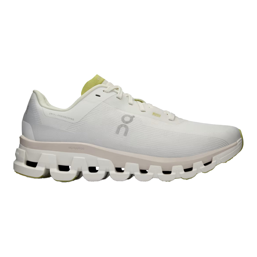 Side view on white background of Womens On Cloudflow running shoe in White/Sand, Medium (Regular) width